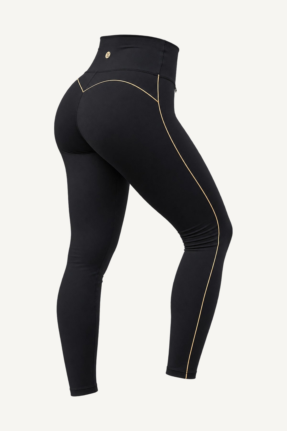 Slimline FlexFlow Treningstights Svart/Gull frilagt, skrått bakfra. En enkelt gullinje langs benet og gullfarget plate ved midjen.